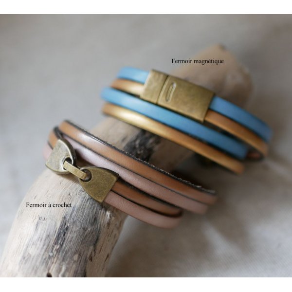 Doppio cinturino in pelle in duo decorato con una tartaruga in bronzo