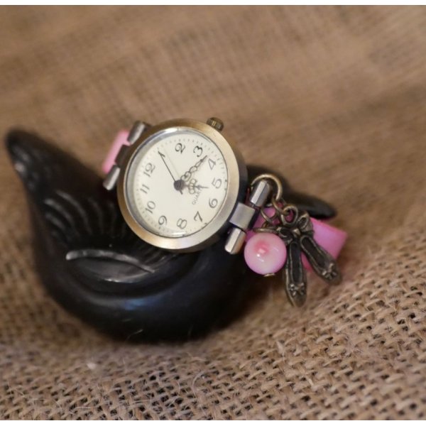 Orologio da ragazza in pelle rosa con cinturino regolabile con charm