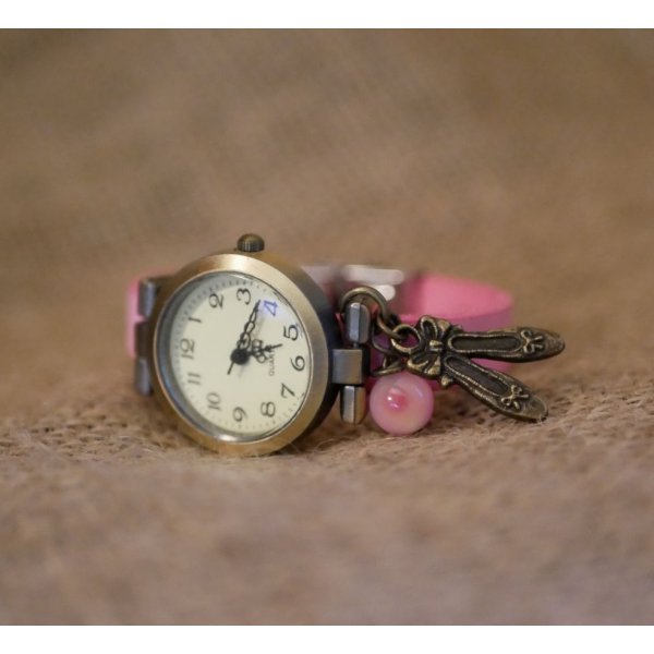 Orologio da ragazza in pelle rosa con cinturino regolabile con charm