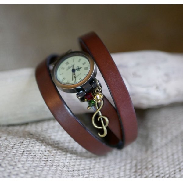 Orologio in stile rasta reggaeb con cinturino in pelle con chiusura regolabile a 2 o 3 giri