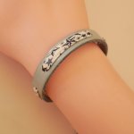 Bracciale Florâme con nastro liberty stelle blu su pelle celeste