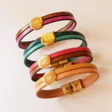 Bracciale Soleil in oro su duo di pelli da personalizzare e incidere